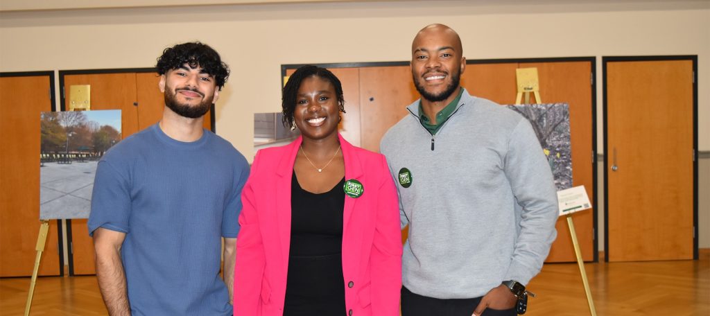 (Pictured left to right): Omer Abdulkareem (Honors Student & Undergraduate Research Assistant), Farida Yada (Doctoral Student and Graduate Research Assistant), and Dr. Lorenzo Hopper (Assistant Professor), host a Photo Art Exhibit on the campus of UNC Charlotte