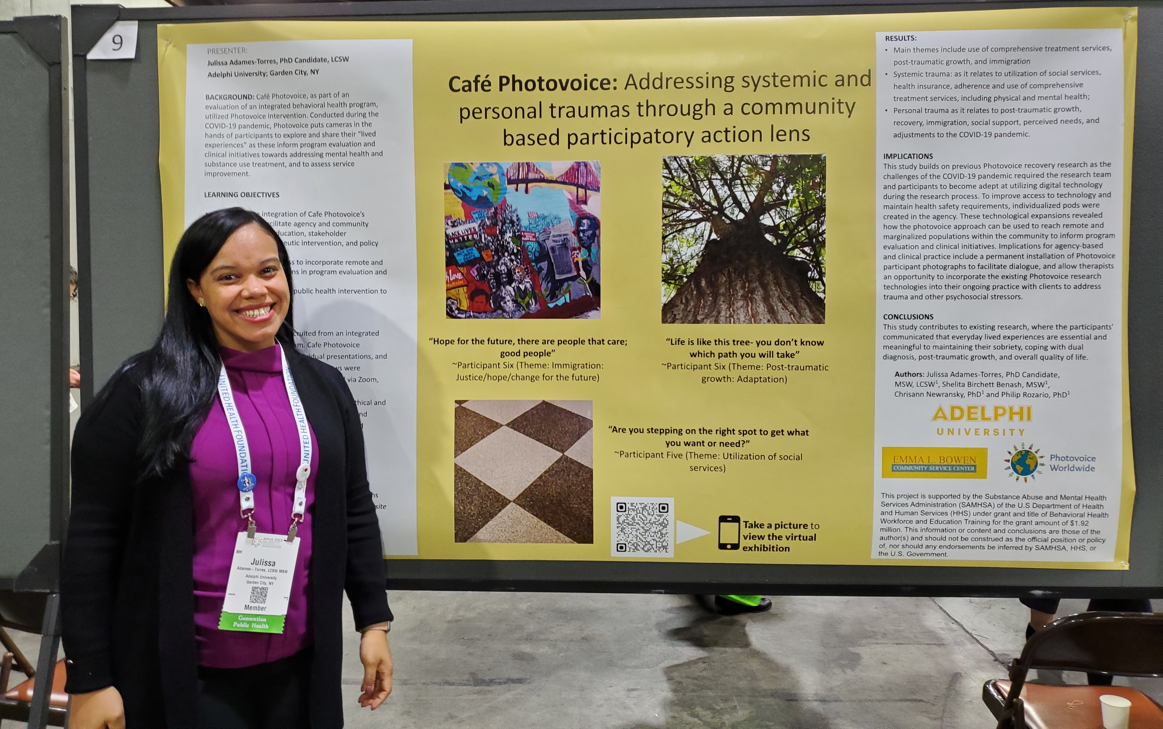 Julissa standing next to her poster from APHA