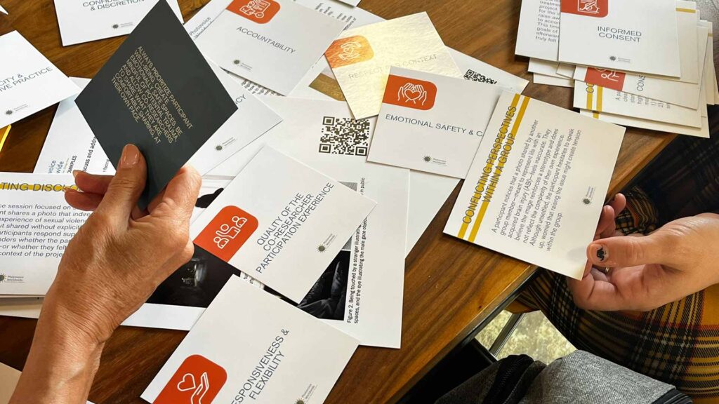 PhotovoiceWorldwide training participants discussing photovoice ethics with our ethics card game.