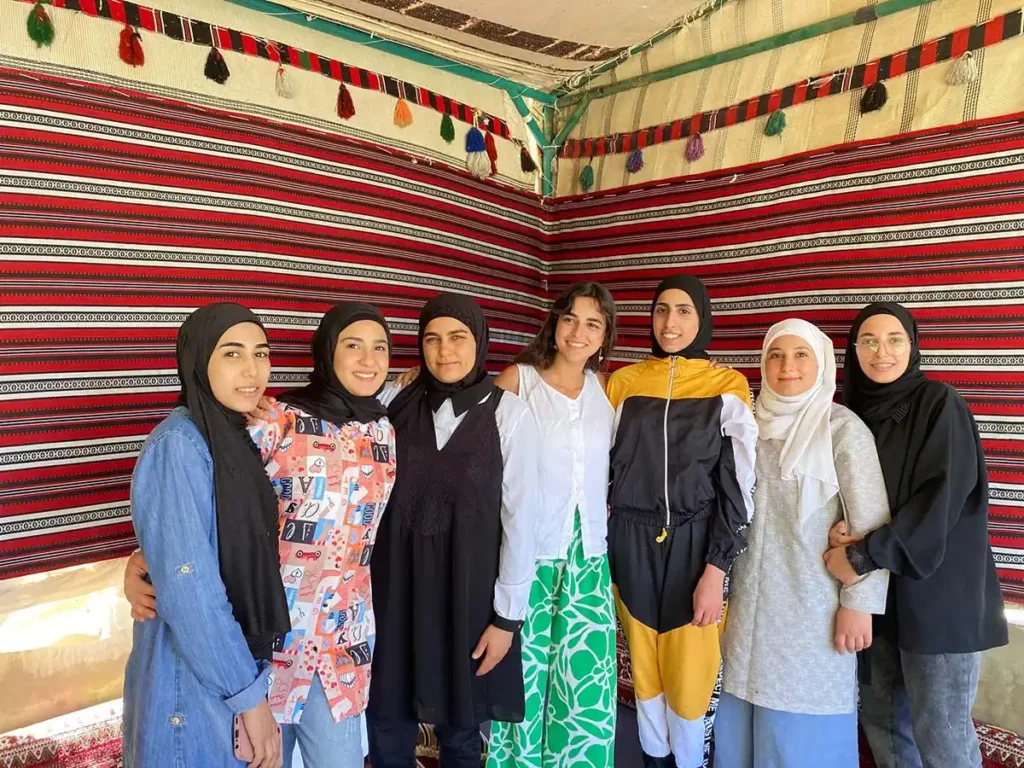 Photovoice mentee Nagham Khalil (center) with Bedouin women coresearchers in Lebanon. Source: Nagham Khalil.